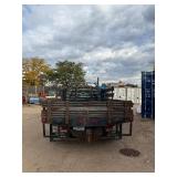 2007 White Chevy 3500 Diesel truck, flatbed with side rails, rack extending over the cab