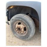 2007 White Chevy 3500 Diesel truck, flatbed with side rails, rack extending over the cab