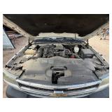 2007 White Chevy 3500 Diesel truck, flatbed with side rails, rack extending over the cab