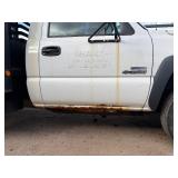 2007 White Chevy 3500 Diesel truck, flatbed with side rails, rack extending over the cab