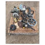 Pallet of corded tools: circular saws, cutoff saws, jigsaws, angle sander, pulleys