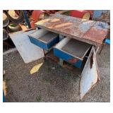 Metal workbench or tool cabinet with 2 drawers and 2 lower cabinet doors.