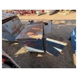 Metal workbench or tool cabinet with 2 drawers and 2 lower cabinet doors.