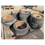 Pallet of (11) Industrial tires and rims, likely for heavy yard equipment