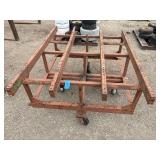 Heavy-duty industrial rolling cart probably designed for transporting pipes or beams 62 ¾” l x 48” w x 33”