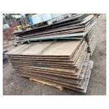 Industrial Steel pallet racking cross beams/uprights, disassembled. Plywood sheets for shelves.