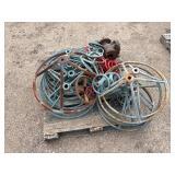 Pallet of valve hand wheels and protective frames. One valve body.