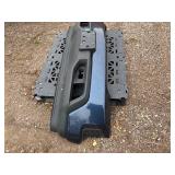 Vehicle Front Bumper Assembly w/ fog light openings, license plate mounting bracket and two-tone color scheme.