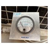 Galvanized steel air handling or ductwork component for HVAC, likely. Purafil Media Bed pressure gauge.