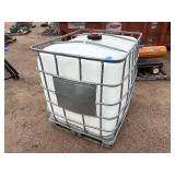 Plastic tank inside a metal cage. L 39 ½” x W 47” x H 46”