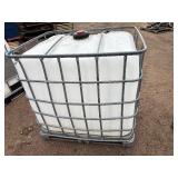 Plastic tank inside a metal cage. L 39 ½” x W 47” x H 46”