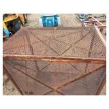 Steel mesh security cage on casters for easy mobility and forklift attachment rack
