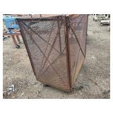 Steel mesh security cage on casters for easy mobility and forklift attachment rack