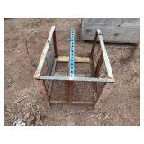 Steel mesh security cage on casters for easy mobility and forklift attachment rack