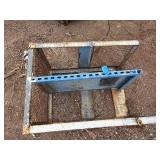 Steel mesh security cage on casters for easy mobility and forklift attachment rack