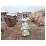 Metal rolling storage cart or cage with two fixed shelves 70” x 48”
