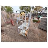 Metal rolling storage cart or cage with two fixed shelves 70” x 48”