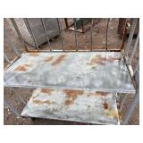 Metal rolling storage cart or cage with two fixed shelves 70” x 48”