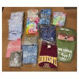 5 shelves of mostly Minnesota shirts, sweatshirts & jackets
