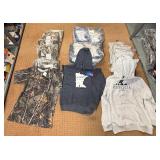 5 shelves of mostly Minnesota shirts, sweatshirts & jackets