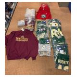 5 shelves of mostly Minnesota shirts, sweatshirts & jackets