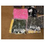 5 shelves of MN, WI, Iowa apparel various sizes designs & colors