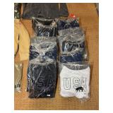 5 shelves of apparel: jackets, hoodies, sweatshirts