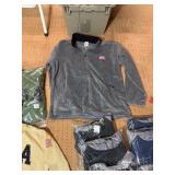 5 shelves of apparel: jackets, hoodies, sweatshirts