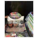 Lighters/smoking accessories:  cigarette cases, grinders, lighters, cig extinguisher, eagle ash trays