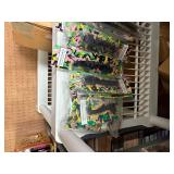 Crossbow and everything  on that shelf plus All Blow darts on floor