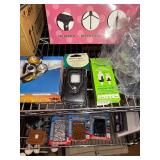 Key chains, Flashlights, rubber bands,  aluminum wallets, poker set in case, shot glasses