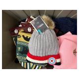 Assorted hats, gloves, masks, Numb Skill Ice Towels, Motley Tubes. Note: All merchandise is new