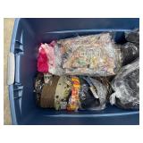 Tub (included) of hats, vinyl decals, lip balm holders