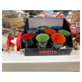 Shirts, sweatshirts, shot glasses, blankets, wallets, winter hats, incense, decals, flash lights, bracelets