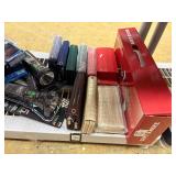 Shirts, sweatshirts, shot glasses, blankets, wallets, winter hats, incense, decals, flash lights, bracelets