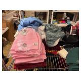 Winter hats, baseball caps and flags (top shelf)