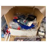 NASCAR lighters, cars, shirts, can coolers, blankets, flasks, desk set, hats, and license plates