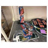 Football tchotchkes: flags, cups, blankets, key chains