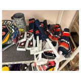 Football tchotchkes: flags, cups, blankets, key chains