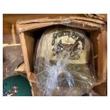 3 shelves of camo/orange hunting gear. Jackets, sweatshirts, hats, foam footballs