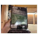 3 shelves of camp hunting gear