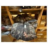 3 shelves of camp hunting gear