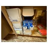 3 shelves of camp hunting gear