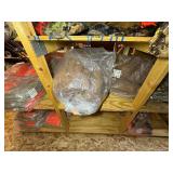 3 shelves of camo/orange hunting gear