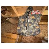 Hats, camo jackets, safety vests, bears in mugs, snow scrapers