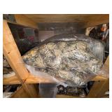 Hats, camo jackets, safety vests, bears in mugs, snow scrapers