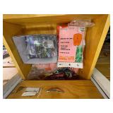 Sunglasses, shirts, chargers, lighters, playing cards, cases, task lights, umbrella, freeze-dried mini bursts