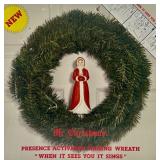 Mr. Christmas Presence Activated Singing Wreath When It Sees You It Sings