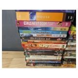 136 DVDs - Assorted Movies and TV Series - Simpsons, NCIS, Cosby, 27 Dresses *C