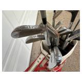 Vintage Golf Bag with Assorted Golf Clubs